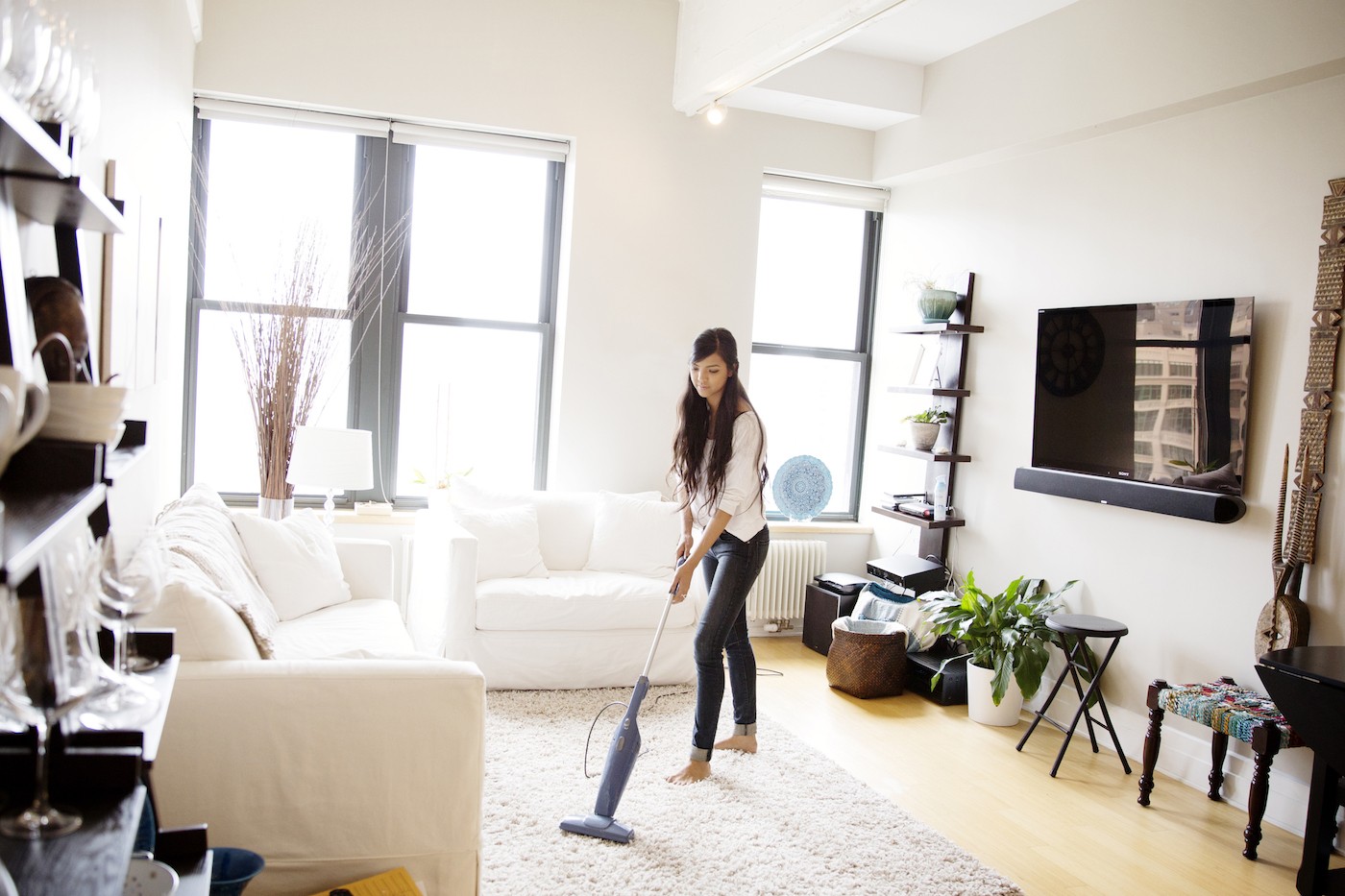 GettyImages woman vacuuming Cavan Images