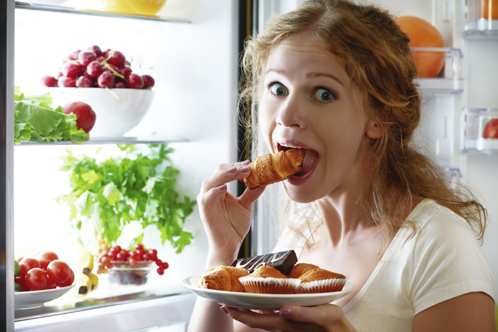 woman late night snacking refridgerator eating food iStock 000069204943 Medium