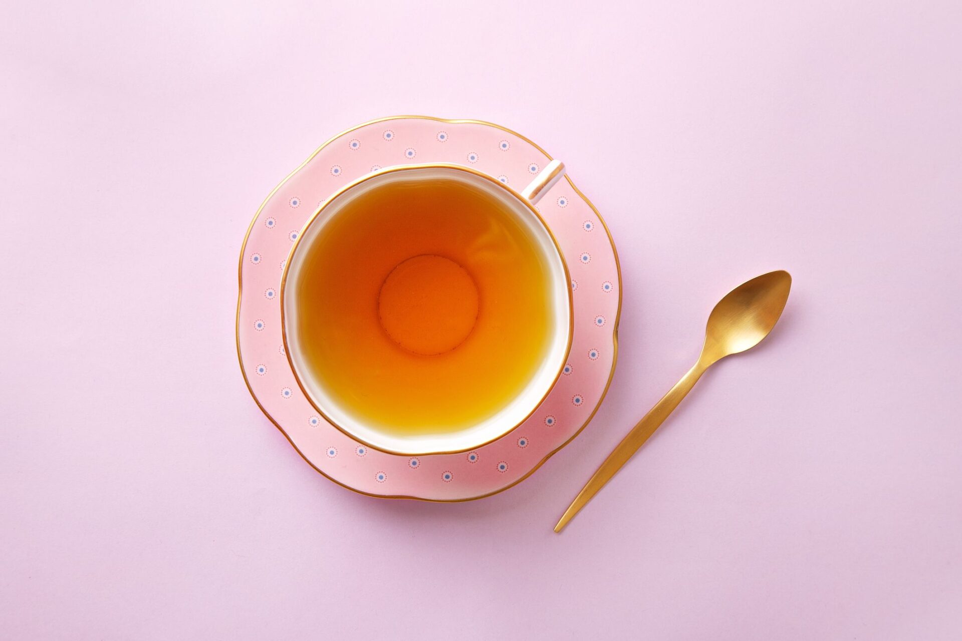 tea cup on pastel pink background top view royalty free image 638040072 1541103904